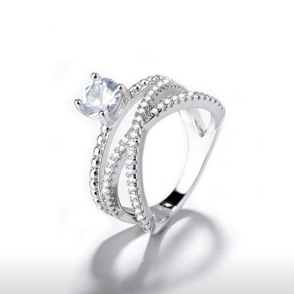 Women's Cubic Zirconia Round Cut on a Infinity Sterling Silver Setting - Picture 1 of 1